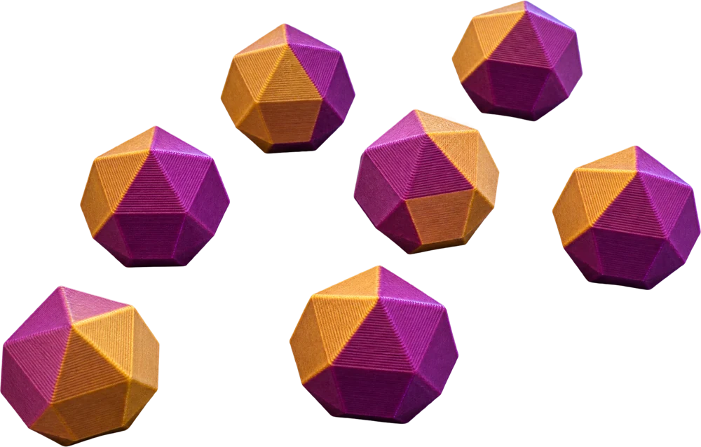 Seven faceted Dexa Jewels in gold and magenta